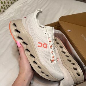 On Running Men's Athletic Shoes in Cream and Orange